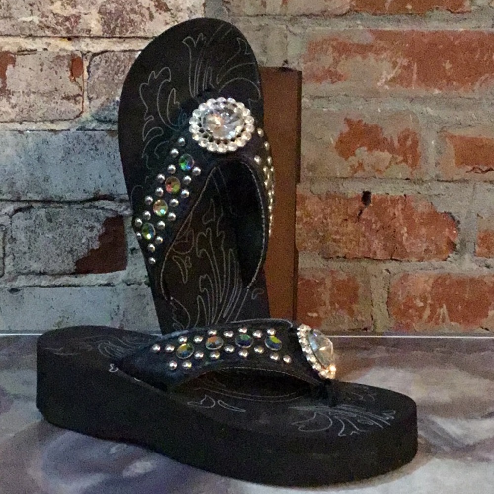 Black rhinestone flip flops
